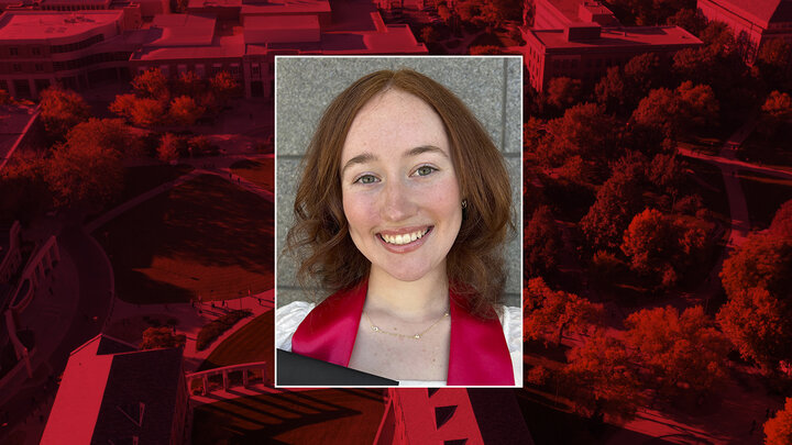 Color portrait of Peyton Kullmann on a red campus background.